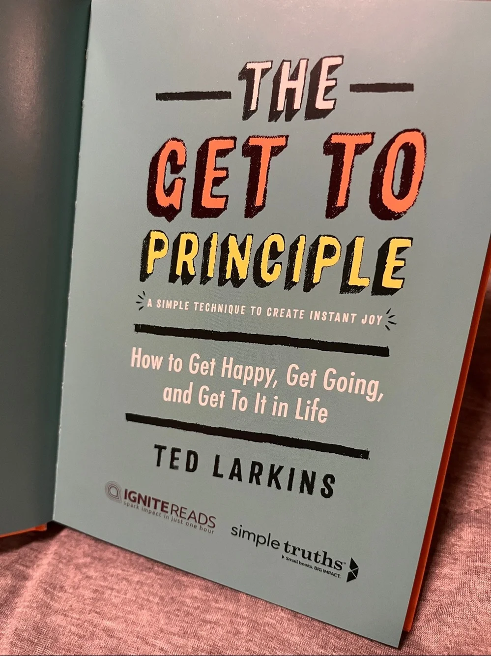 The Get To Principle by Ted Larkins - Bright Orange Hardcover